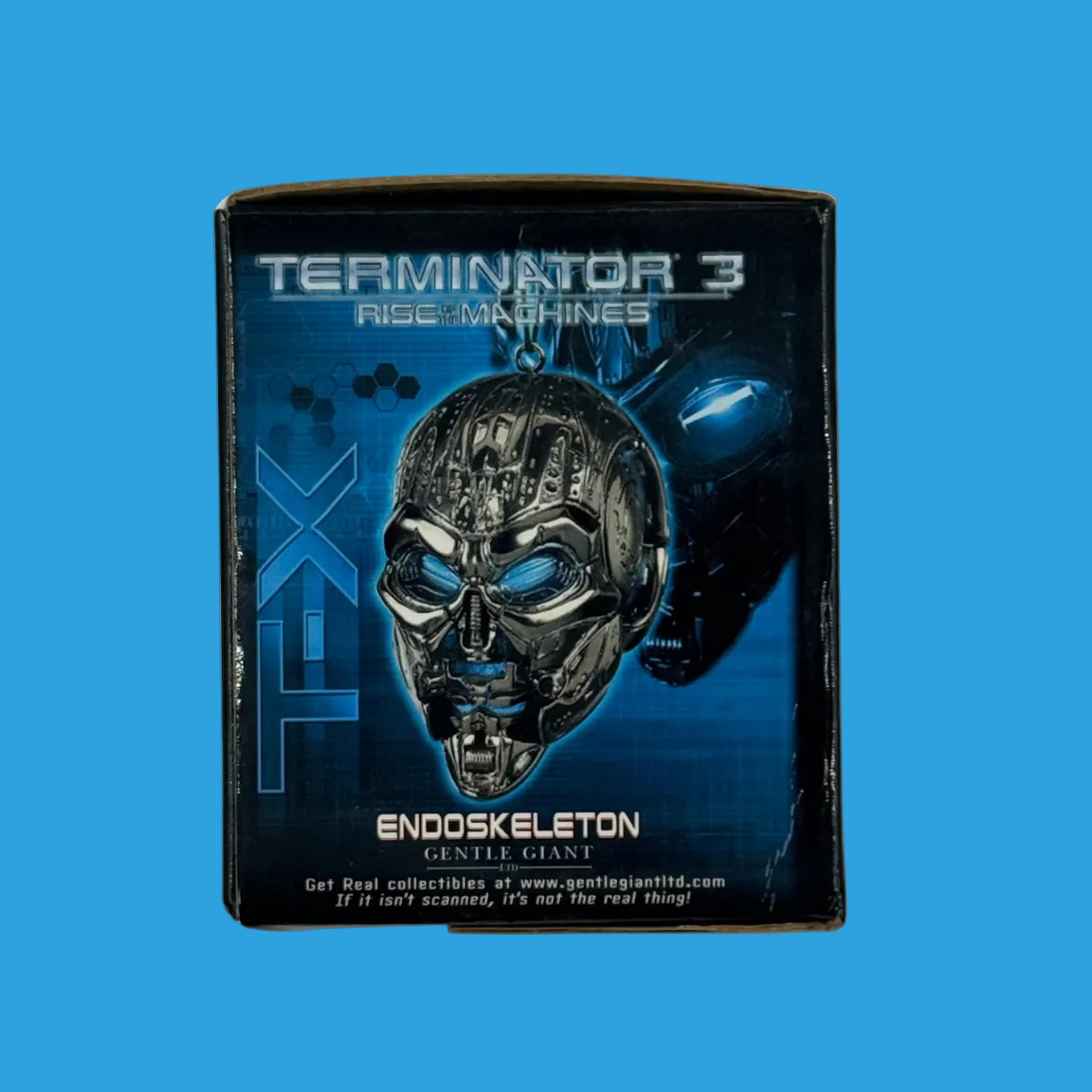 A Terminator 3 FX makeup product box featuring the Endoskeleton prosthetic, with a blue and black design and a metallic robot face graphic.